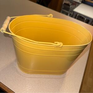 Golden yellow tin caddy bucket with wooden handle